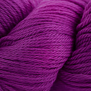 Skein of Cascade 220 Worsted weight yarn in the color Magenta (Pink) for knitting and crocheting.