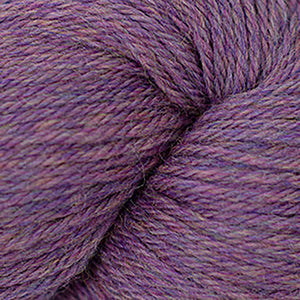 Skein of Cascade 220 Worsted weight yarn in the color Petunia Heather (Purple) for knitting and crocheting.