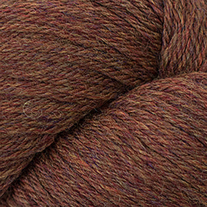 Skein of Cascade 220 Worsted weight yarn in the color Pumpkin Spice (Orange) for knitting and crocheting.