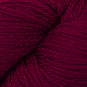 Skein of Cascade 220 Worsted weight yarn in the color Ruby (Red) for knitting and crocheting.
