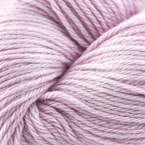 Skein of Cascade 220 Worsted weight yarn in the color Soft Pink (Pink) for knitting and crocheting.