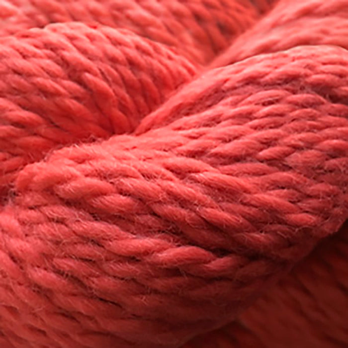 Skein of Cascade Baby Alpaca Chunky Bulky weight yarn in the color Poppy Red (Red) for knitting and crocheting.