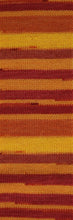 Load image into Gallery viewer, Skein of Cascade Heritage Prints Sock weight yarn in the color Flames Stripe (Red) for knitting and crocheting.
