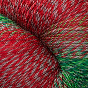 Skein of Cascade Heritage Wave Sock weight yarn in the color Holidaze (Red) for knitting and crocheting.