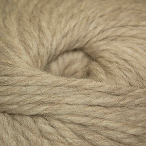 Skein of Cascade Llana Grande Super Bulky weight yarn in the color Beige (Tan) for knitting and crocheting.