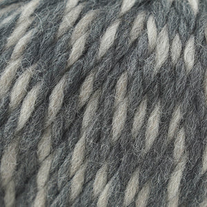 Skein of Cascade Llana Grande Super Bulky weight yarn in the color Space Needle (Gray) for knitting and crocheting.