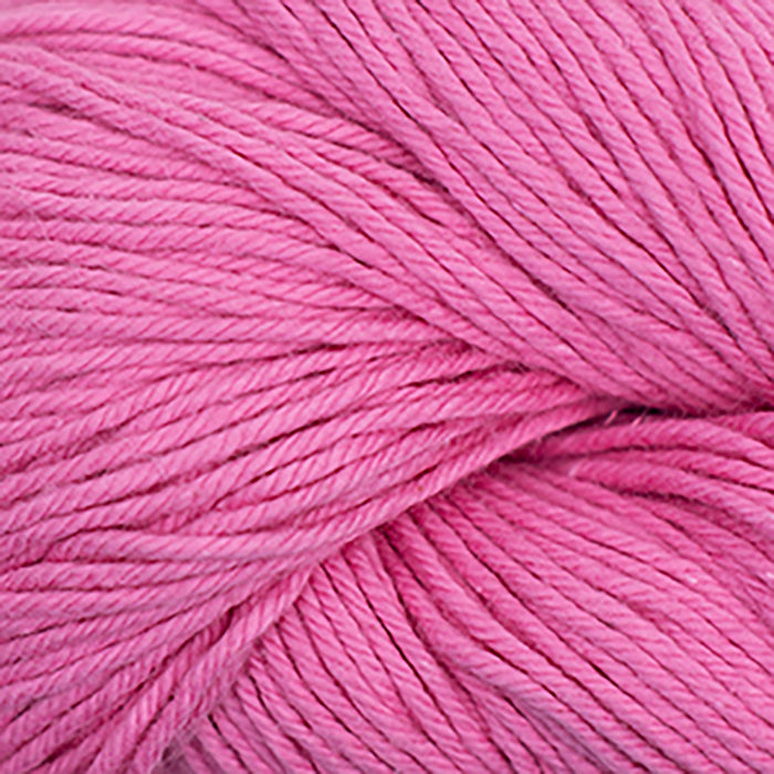 Skein of Cascade Nifty Cotton Worsted weight yarn in the color Rose Pink (Pink) for knitting and crocheting.