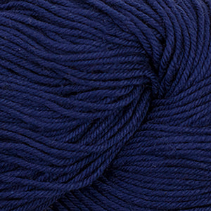 Skein of Cascade Nifty Cotton Worsted weight yarn in the color Sapphire (Blue) for knitting and crocheting.