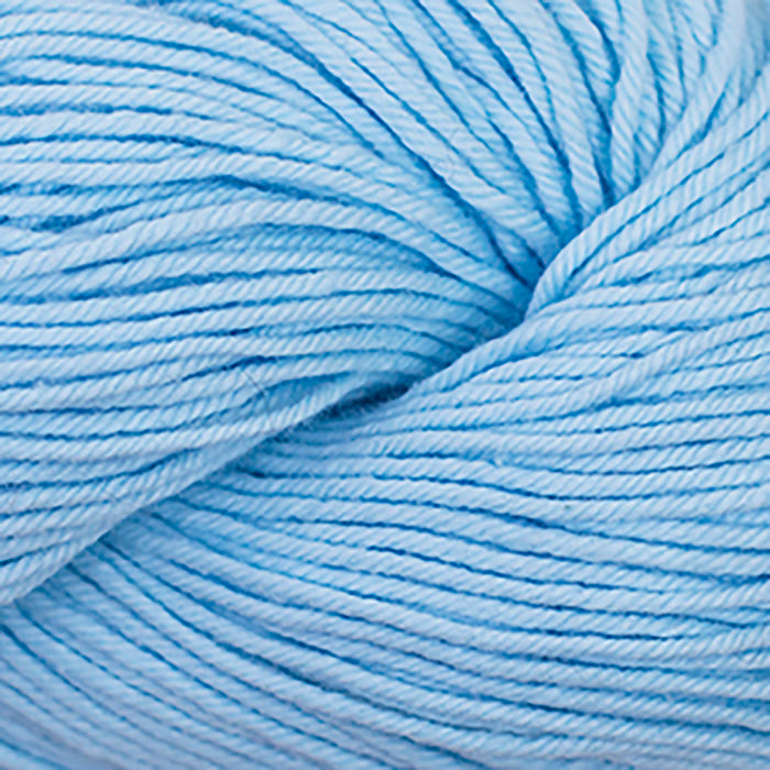 Skein of Cascade Nifty Cotton Worsted weight yarn in the color Soft Blue (Blue) for knitting and crocheting.