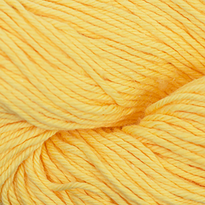 Skein of Cascade Nifty Cotton Worsted weight yarn in the color Yellow (Yellow) for knitting and crocheting.