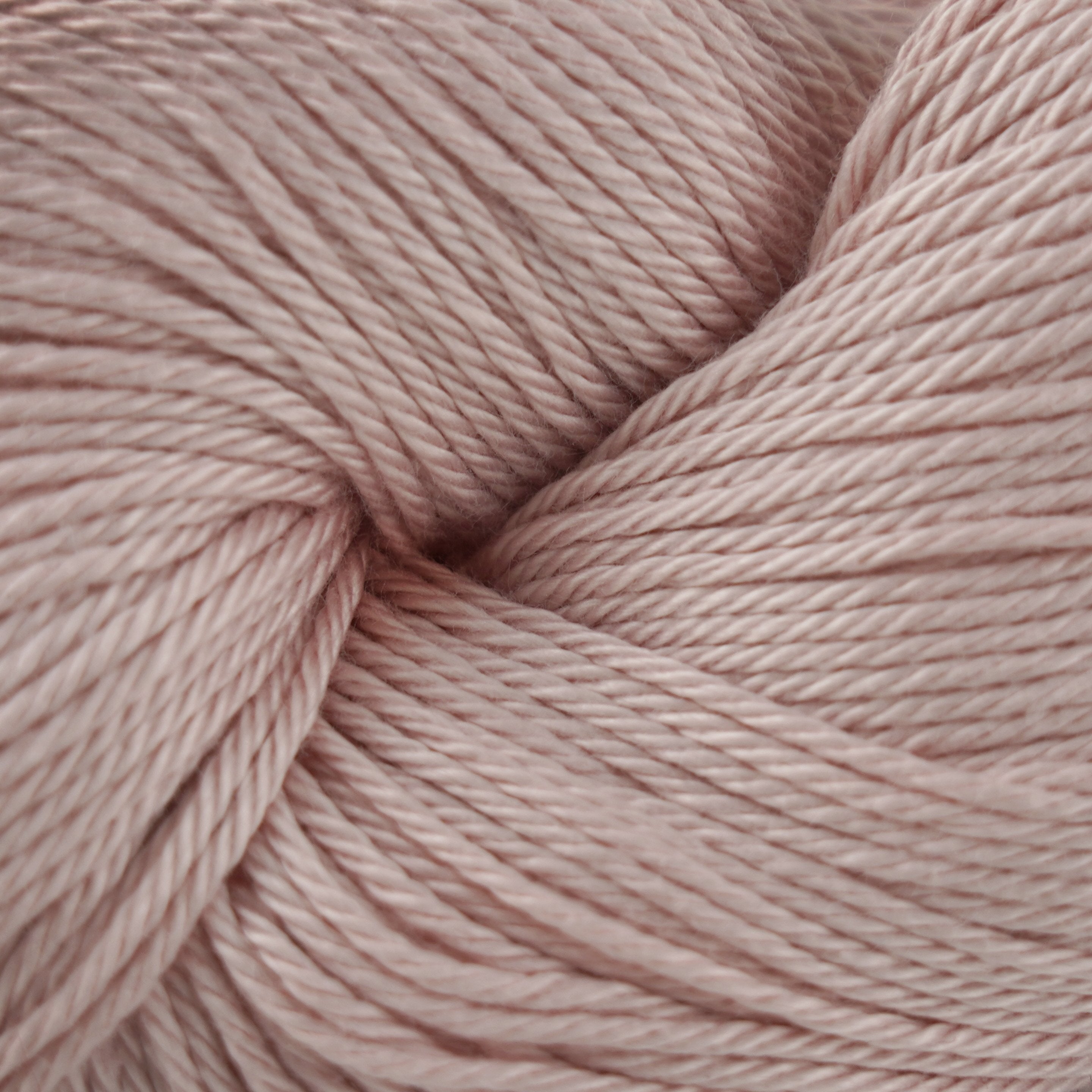 Skein of Cascade Ultra Pima DK weight yarn in the color Veiled Rose (Pink) for knitting and crocheting.