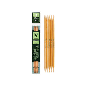Clover 7" Takumi Double-Pointed Knitting Needles in and outside of packaging