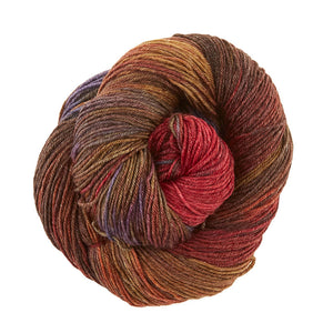 Skein of Manos del Uruguay Feliz Space-Dyed DK weight yarn in the color Autumn (Red) for knitting and crocheting.