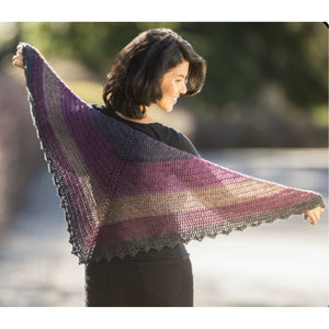 A beautiful shawl crocheted with Cascade  Whirligig yarn and a pattern from the Dark Sky Shawl Crochet Kit.
