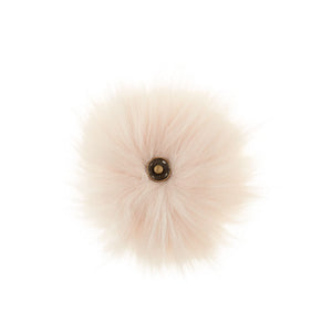 A soft and fuzzy, faux(fake) fur pom pom with a built-in snap on attachment that makes it easy to add to, and remove from, any project. This pom pom is cream.