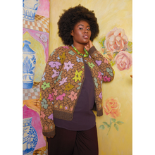 Load image into Gallery viewer, The Mosaic Flower Jacket has a classic silhouette that is incredibly easy to wear. Worked in stocking stitch throughout, and using 11 shades of the beautiful Felted Tweed, this jacket uses a combination of the intarsia and fairisle techniques. The jacket features a crew neck, long sleeves and a ribbed hem and cuffs.
