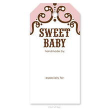 Load image into Gallery viewer, A gift tag is shown with the words Sweet Baby and a decorative scroll with pink colorblocking.
