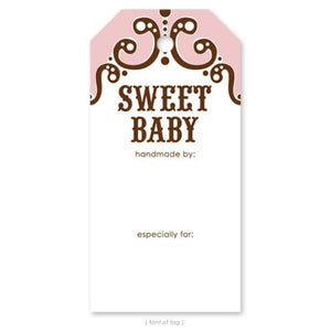 A gift tag is shown with the words Sweet Baby and a decorative scroll with pink colorblocking.