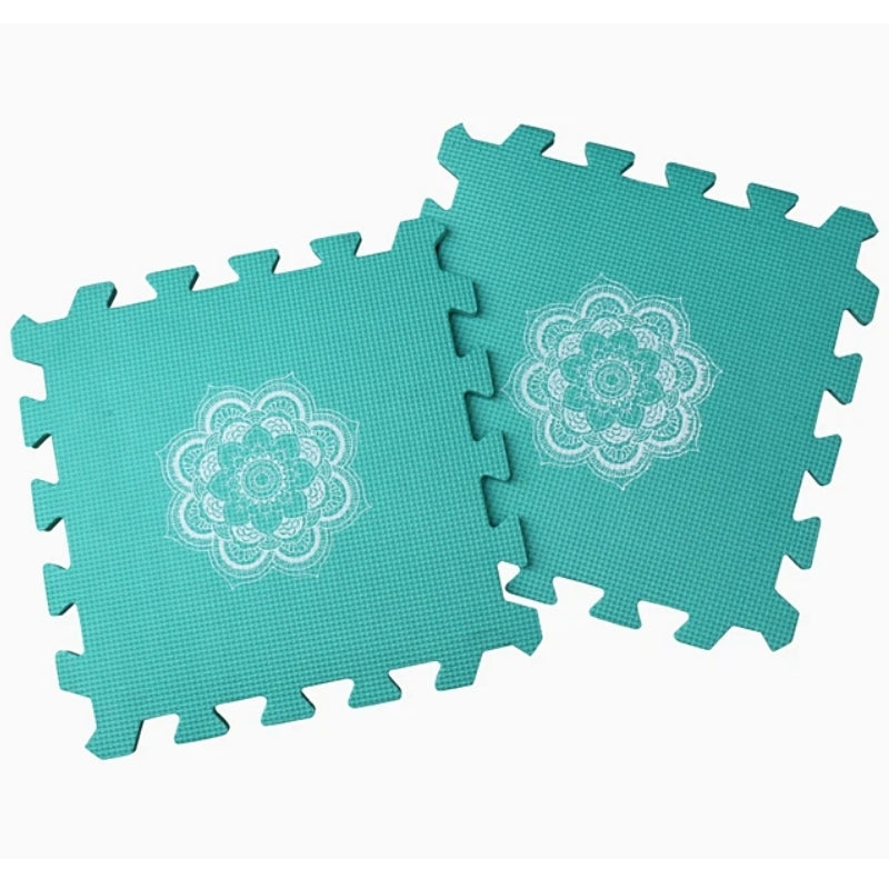 A set of light turquoise blocking mats printed with mindful Mandalas by Knitter's Pride makes blocking knit and crochet projects easy.