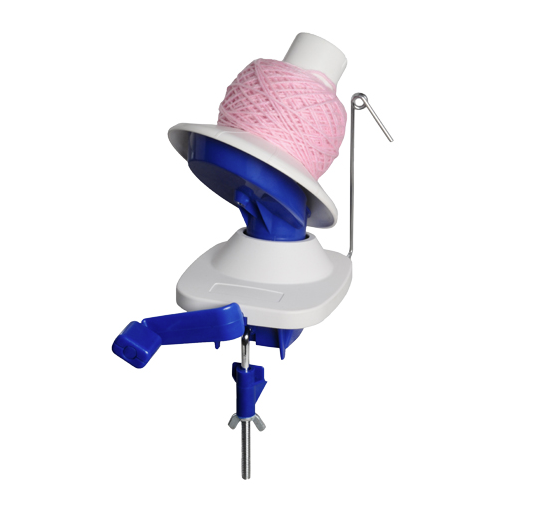 A plastic wool winder makes winding yarn into a ball simple.