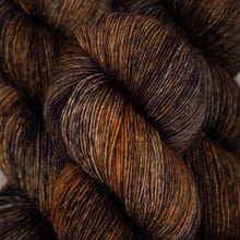 Load image into Gallery viewer, Skein of Madelinetosh Tosh Vintage Worsted weight yarn in the color Coffe Grounds (Brown) for knitting and crocheting.
