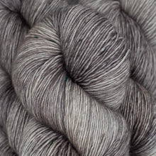 Load image into Gallery viewer, Skein of Madelinetosh Tosh Vintage Worsted weight yarn in the color Kitten (Gray) for knitting and crocheting.

