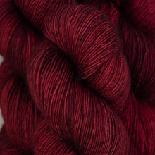 Load image into Gallery viewer, Skein of Madelinetosh Tosh Vintage Worsted weight yarn in the color Tart (Red) for knitting and crocheting.
