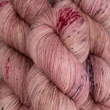 Load image into Gallery viewer, Skein of Madelinetosh Tosh Vintage Worsted weight yarn in the color Copper Pink (Pink) for knitting and crocheting.
