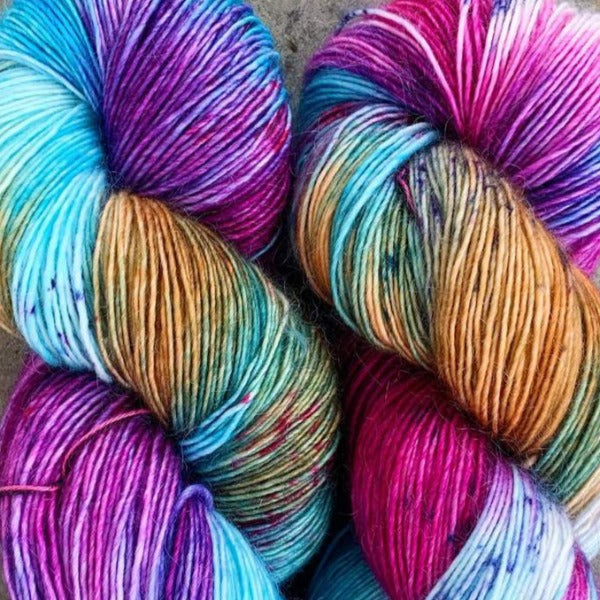 Skein of Madelinetosh Tosh Vintage Worsted weight yarn in the color Cotton Candy Daydreams (Multi) for knitting and crocheting.
