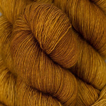 Load image into Gallery viewer, Skein of Madelinetosh Tosh Vintage Worsted weight yarn in the color Glazed Pecan (Brown) for knitting and crocheting.
