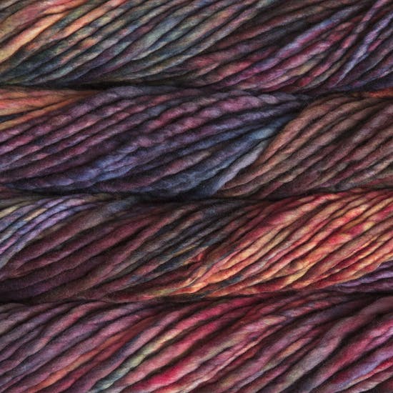 Skein of Malabrigo Rasta Super Bulky weight yarn in the color Aniversario (Red) for knitting and crocheting.