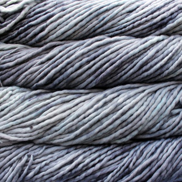 Skein of Malabrigo Rasta Super Bulky weight yarn in the color Cape Cod Gray (Gray) for knitting and crocheting.