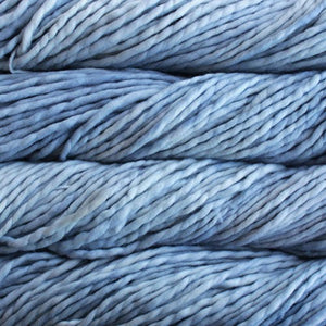 Skein of Malabrigo Rasta Super Bulky weight yarn in the color Cosmos (Blue) for knitting and crocheting.