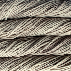 Skein of Malabrigo Rasta Super Bulky weight yarn in the color Fog (Tan) for knitting and crocheting.