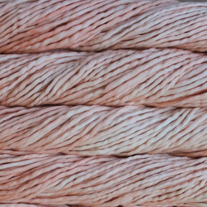 Skein of Malabrigo Rasta Super Bulky weight yarn in the color Melon (Pink) for knitting and crocheting.