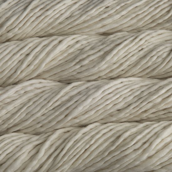 Skein of Malabrigo Rasta Super Bulky weight yarn in the color Natural (Cream) for knitting and crocheting.