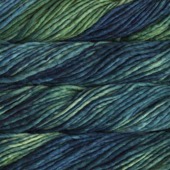 Skein of Malabrigo Rasta Super Bulky weight yarn in the color Solis (Green and Blue) for knitting and crocheting.