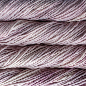 Skein of Malabrigo Rasta Super Bulky weight yarn in the color Valentina (Pink) for knitting and crocheting.