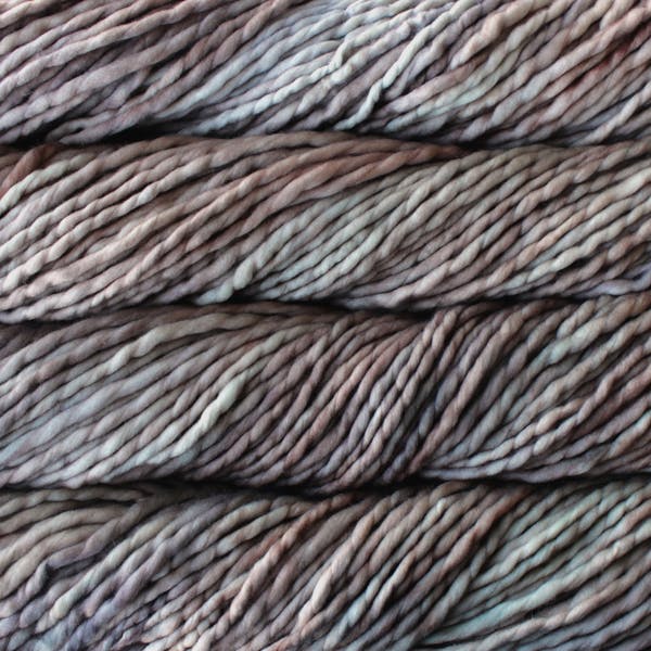 Skein of Malabrigo Rasta Super Bulky weight yarn in color Whole Grain (Brown) for knitting and crocheting.