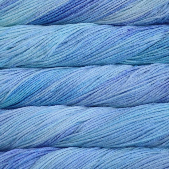 Skein of Malabrigo Rios Worsted weight yarn in the color Aquamarine (Blue) for knitting and crocheting.