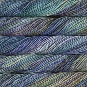Skein of Malabrigo Rios Worsted weight yarn in the color Indiecita (Purple) for knitting and crocheting.