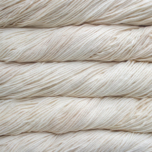 Skein of Malabrigo Rios Worsted weight yarn in the color Ivory (Cream) for knitting and crocheting.