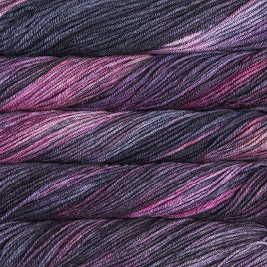 Skein of Malabrigo Rios Worsted weight yarn in the color Purpuras (Purple) for knitting and crocheting.