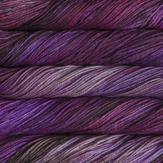 Skein of Malabrigo Rios Worsted weight yarn in the color Sabiduria (Purple) for knitting and crocheting.