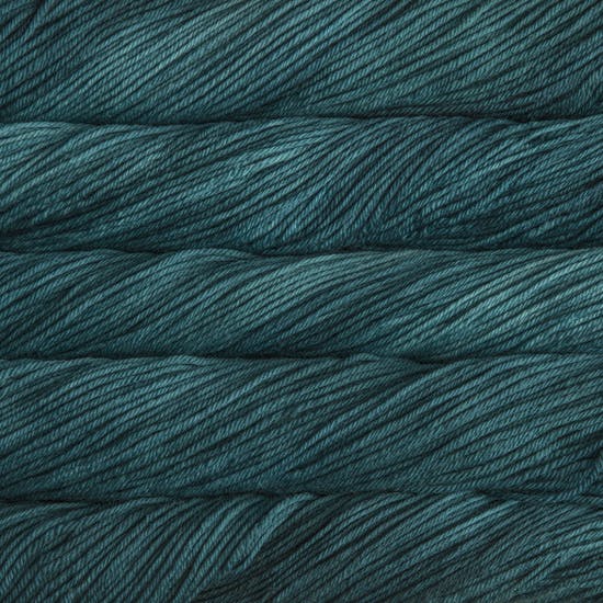 Skein of Malabrigo Rios Worsted weight yarn in the color Teal Feather (Blue) for knitting and crocheting.