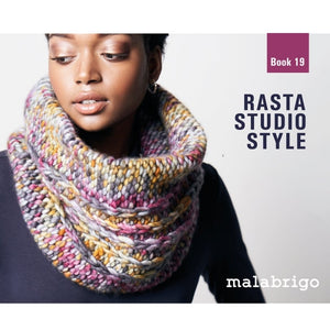 The Cover of Malabrigo Rasta Book 19 is shown, featuring a model wearing the Flynn Cowl.