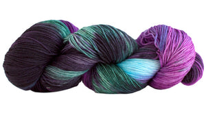 Skein of Manos del Uruguay Alegria Space-Dyed Sock weight yarn in the color Agave (Purple) for knitting and crocheting.
