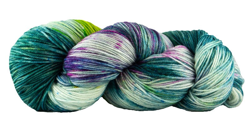 Skein of Manos del Uruguay Alegria Space-Dyed Sock weight yarn in the color Orquidea (Green) for knitting and crocheting.