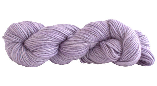 Skein of Manos del Uruguay Silk Blend DK weight yarn in the color Malva (Purple) for knitting and crocheting.