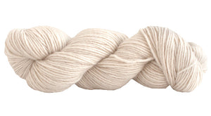 Skein of Manos del Uruguay Silk Blend DK weight yarn in the color Natural (Cream) for knitting and crocheting.